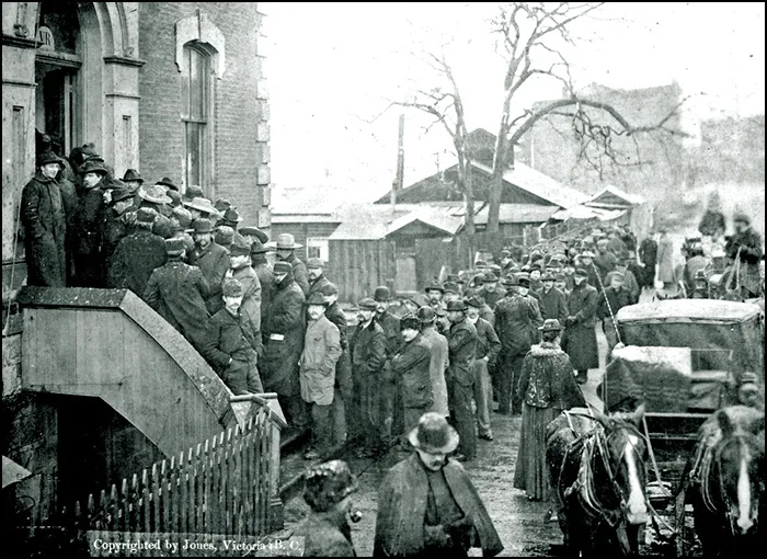 Goldrushers buying miner’s licenses at Custom House in 1898, Victoria, B C. Photo By John Wallace Jones.